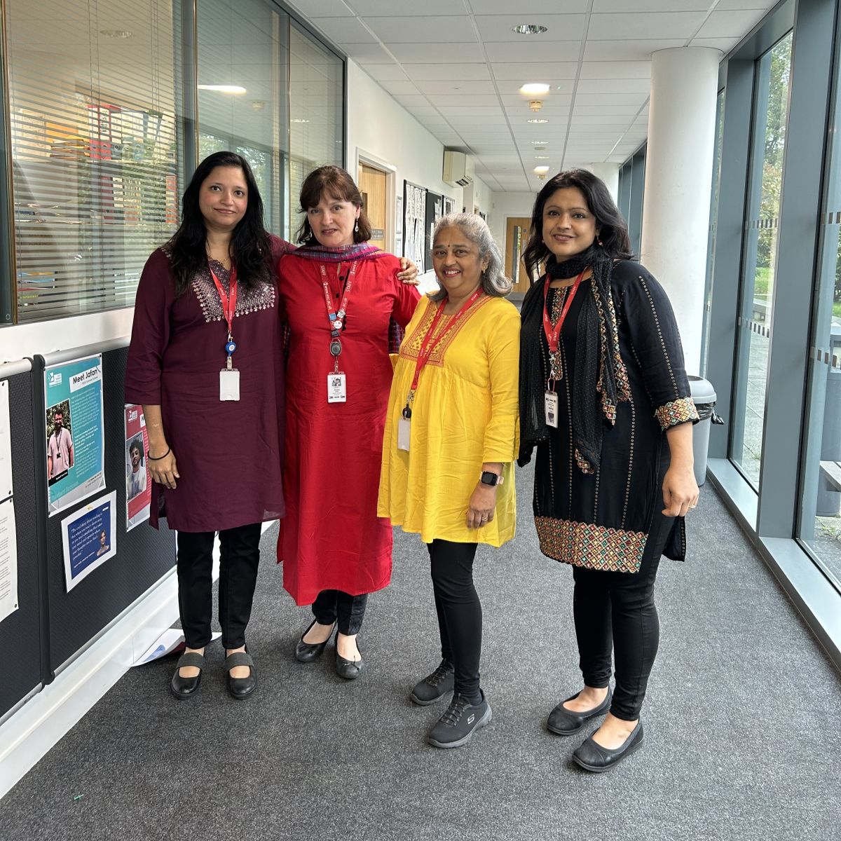 ESC staff dressed in their cultural attire