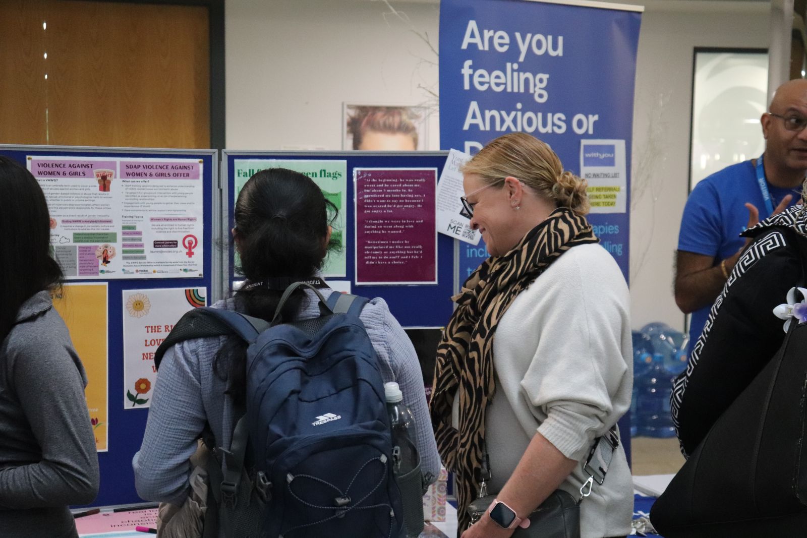 Student talking with representative